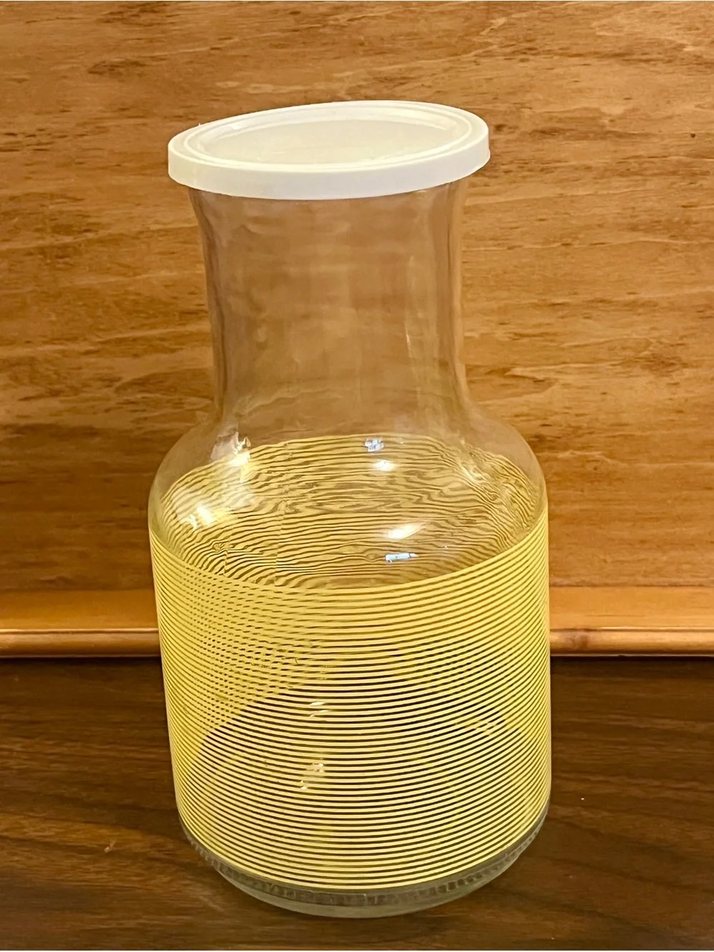 Clear Glass Carafe with Yellow Band and White Lid